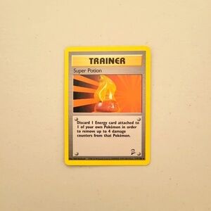 Pokemon Trainer Card with Yellow and Orange